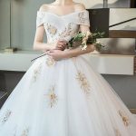 Sophisticated Off-Shoulder Cathedral Train Lace Wedding Dress