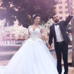 Elegant Ball Gown Wedding Dresses with Lace Applique and Long Sleeves