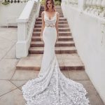 Stunning Train Sleeveless V-neck Lace Mermaid Bridal Gown