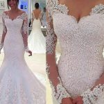 Elegant Trumpet Bridal Wedding Dress with Beaded Ivory Lace and Illusion Sleeves