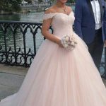 Elegant Blush Pink Beaded Ball Gown with Off-Shoulder Design
