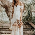 Graceful Lace Off-the-Shoulder A-Line Bridal Gown with Floor-Length Skirt