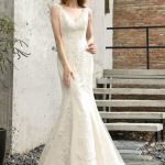Glamorous Mermaid Satin Lace Wedding Dress with an Open Back Design
