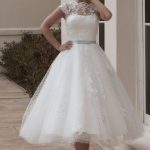 Elegant Beach Wedding Dress with Cap Sleeves and Lace Details