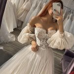 A-Line Tulle Wedding Dress with Off-the-Shoulder Puffy Sleeves and Floral Lace