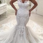 Stunning Mermaid Tulle Bridal Gown with Spaghetti Straps and Lace Details