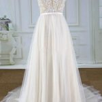 Tulle A-Line Wedding Dress with Lace Details and a Chapel Train for a Chic Bride