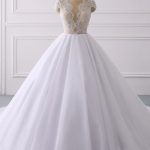 Elegant Ball Gown Wedding Dress with Cap Sleeves and Illusion Neckline