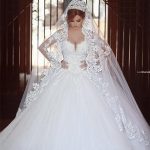 Stunning Lace Ball Gown Wedding Dress with Long Sleeves and Sweep Train
