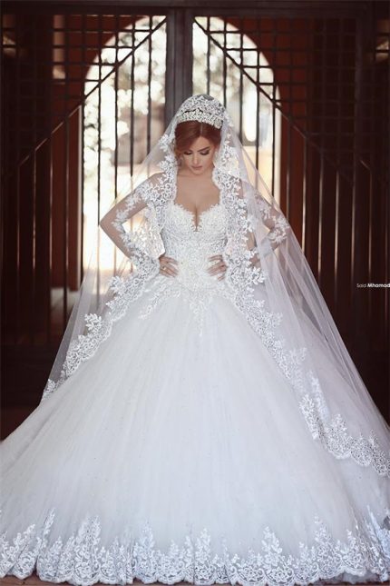 Stunning Lace Ball Gown Wedding Dress with Long Sleeves and Sweep Train