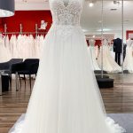 Sleeveless Lace A-Line Wedding Dress with Tulle Skirt and V-Neckline