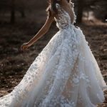 Backless A-Line Wedding Dress with Short Sleeves and Deep V-Neckline