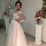 A-Line Sweep Train Bridal Dress with Delicate Lace Appliques and Long Sleeves