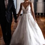 Elegant V-Neck Wedding Dress with A-Line Silhouette Lace and Spaghetti Straps