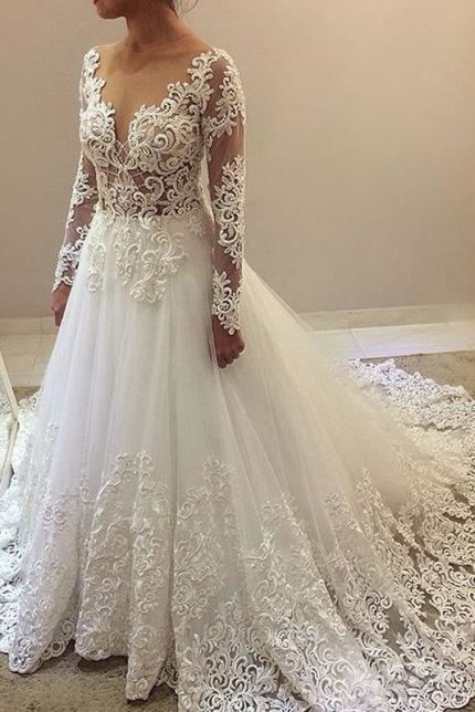 Sheer Neck Ball Gown Wedding Dress with Elegant Beading and Long Sleeves