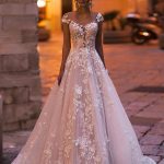 Backless Sequins Wedding Dress with Ruffled Tulle and Elegant Lace Appliques
