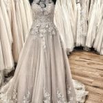 Ruffles Train Wedding Dress with Backless Halter and Elegant Lace AppliquesLong A-Line Silhouette