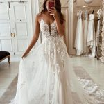 Graceful V-Neck Spaghetti Straps Wedding Dress with A-Line Silhouette and Elegant Lace Backless Design
