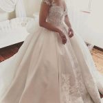 Fascinating Ball Gown Wedding Dress with Satin Sheer Neckline and Appliques
