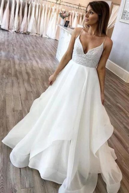 Simple Wedding Dress with Floor Length and Spaghetti Straps for Beach Ceremonies