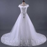 Elegant Beaded Ball Gown Wedding Dresses with Glamorous Lace-Up Details