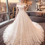 Luxurious Beaded Ball Gown Wedding Dresses with Glamorous Lace-Up Design
