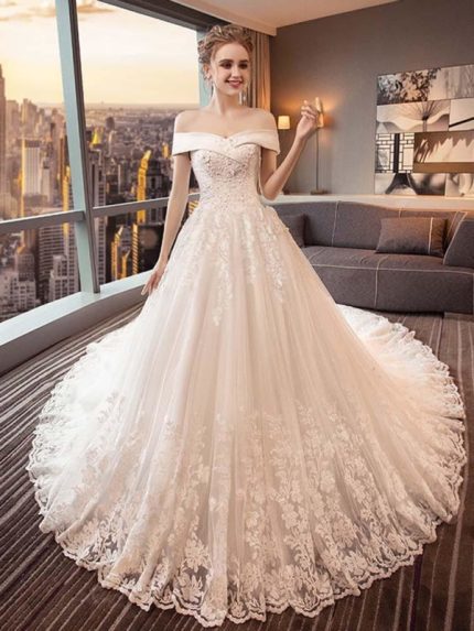 Luxurious Beaded Ball Gown Wedding Dresses with Glamorous Lace-Up Design