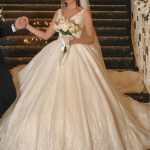 Enchanting V-Neck Tulle Wedding Dress with Lace AppliquesGlamorous Long Ball Gown Silhouette