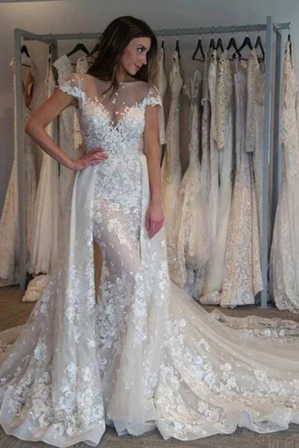 Enchanting Sheer Neck Wedding Dress with Cap Sleeves and a Long Detachable Train for a Gorgeous Style