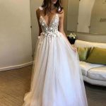 Elegant Appliques Tulle Wedding Dresses with Deep V-Neck for a Gorgeous Look