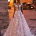 Exquisite A-Line Tulle Bridal Dress with Sleeveless Design and Floor Length for a Gorgeous Lace Wedding Look