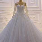 Beautiful A-Line Wedding Dress with Long Sleeves Bateau Neckline Pearl Tulle and Appliques Lace