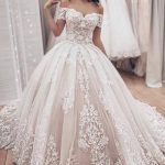Luxurious Ball Gown Wedding Dress with Off-the-Shoulder Neckline and Lace Appliquesa Gorgeous Style