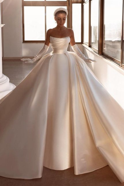 Sparkling Ball Gown Satin Wedding Dress with Strapless Design and Beadings Available Online