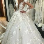 Romantic Princess Wedding Dress with Bateau Neckline Appliques Lace Backless Design and Ruffled Details Featuring Sleeves
