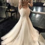 Magnificent Mermaid Ivory Wedding Dress with V-Neck Long Sleeves and a Gown Silhouette