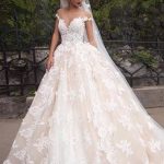 Chic Sheer Neck A-Line Wedding Dress with Cap Sleeves and Lace Appliques