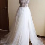 Elegant Halter Princess Wedding Dress with Illusion Neckline High Split and A-Line Silhouette