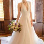 Chic Court Tulle Wedding Dress with Halter Neckline Open Back and Sleeveless Design