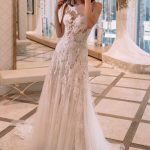Beautiful Ivory Lace Tulle Wedding Dress with Illusion Back and A-Line Silhouette