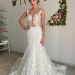 Chic Sleeveless Mermaid Wedding Dress with Illusion Neckline and White Lace