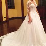 Stunning A-Line Lace Tulle Wedding Dress with Illusion Sleeve and Beaded Details