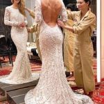 Gorgeous Mermaid Lace Wedding Dress with Backless Design and Long Sleeves Ivory
