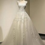 Sleeveless A-Line Bateau Wedding Dress with Tulle Fabric and Court Train Ivory