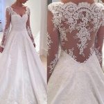 Illusion Long Sleeve Wedding Dress with A-Line Silhouette Lace Satin and Floor-Length