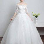 Ivory A-Line Bridal Dress with Lace Up and Half SleevesSequined Floor Length Lace Wedding Dress