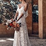Ivory A-Line Sleeveless V-Neck Backless Bridal Gowns with TrainLace Wedding Dress