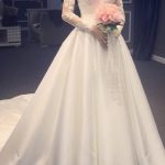 Long Sleeve Chapel Satin A-Line Wedding Dress with V-Neck and Lace Details