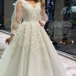 Appliques Lace Tulle Wedding Dress With Puffy Long Sleeves and V Neck in Long A-Line Style