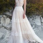 Sweep Brush Train Tulle Backless Wedding Dresses with V Neck in Long A-Line Style